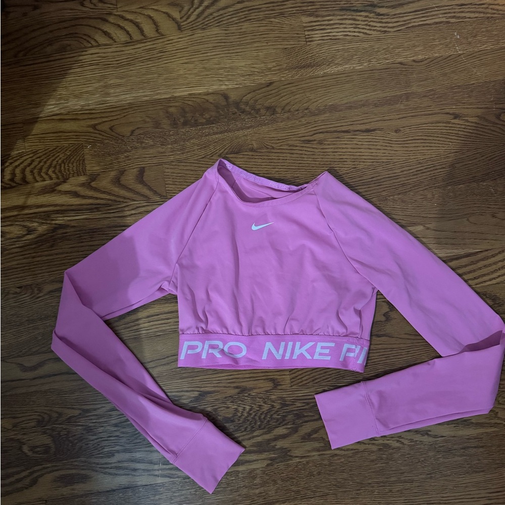 Pink long sleeved workout top